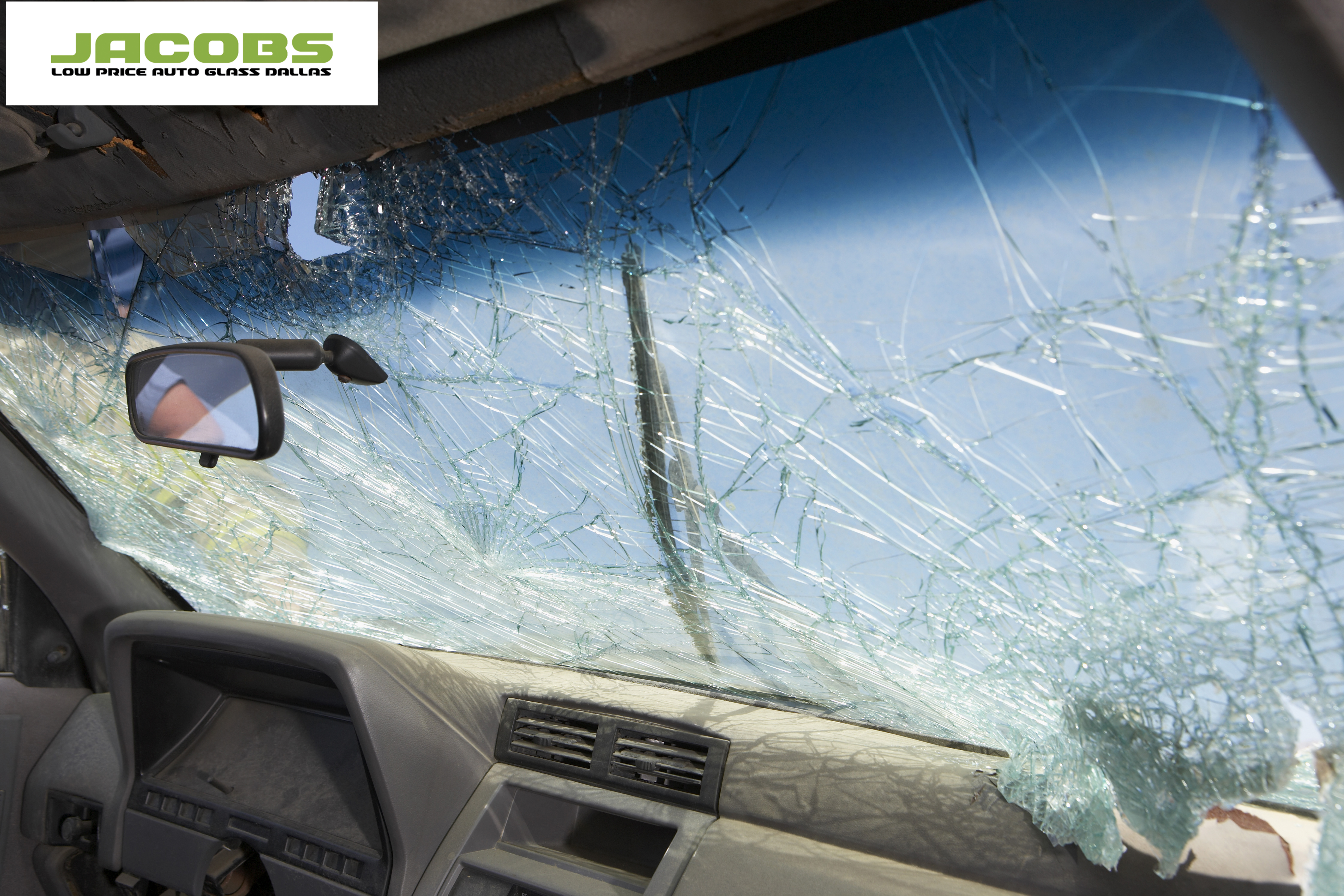 Broken windshield of car, view from interior